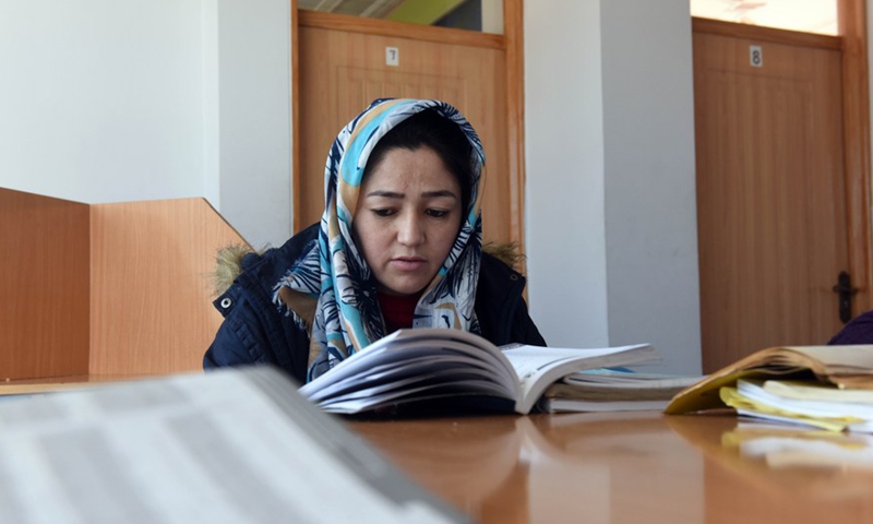 An Afghan girl attends a book reading competition in Kabul, capital of Afghanistan, on Jan. 31, 2022.Photo:Xinhua