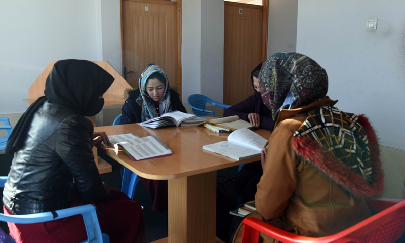 Afghan girls attend a book reading competition in Kabul, capital of Afghanistan, on Jan. 31, 2022.Photo:Xinhua