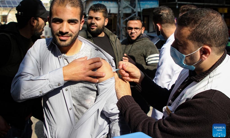 A Palestinian man receives a dose of COVID-19 vaccine during a vaccination campaign in Gaza City, on Feb. 7, 2022.(Photo: Xinhua)