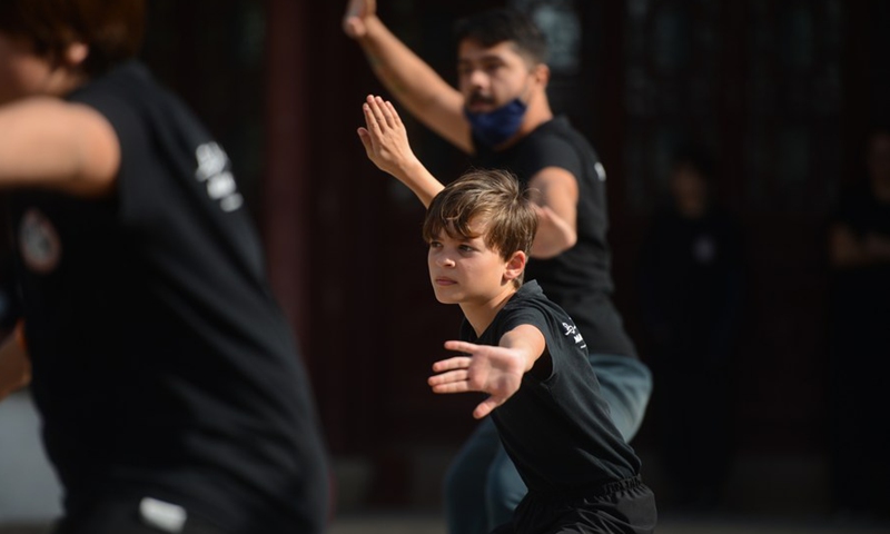 Students from the Maltese Wushu-Longgui School perform Chinese martial arts at the Serenity Garden, a traditional Chinese garden, in St. Lucia, Malta, on February 6, 2022. (Photo: Xinhua)