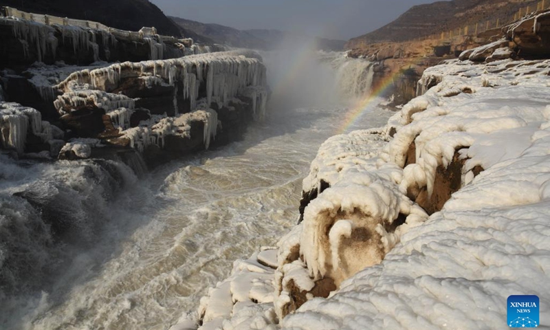 Aerial photo taken on Feb. 9, 2022 shows the scenery of the frozen Hukou Waterfall on the Yellow River in Jixian County, north China's Shanxi Province.(Photo: Xinhua)