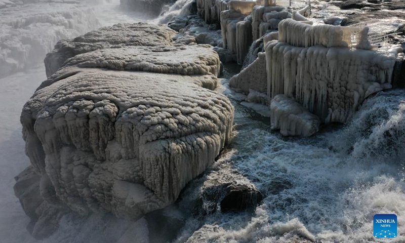 Aerial photo taken on Feb. 9, 2022 shows the scenery of the frozen Hukou Waterfall on the Yellow River in Jixian County, north China's Shanxi Province.(Photo: Xinhua)