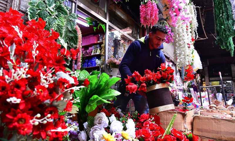 Photo taken on Feb. 10, 2022 shows a Syrian shopkeeper preparing gifts for the upcoming Valentine's Day in the capital Damascus.(Photo: Xinhua)