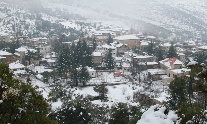 Snow covers the town of Qanat in the Bcharre district, northern Lebanon, on Jan. 28, 2022.Photo:Xinhua