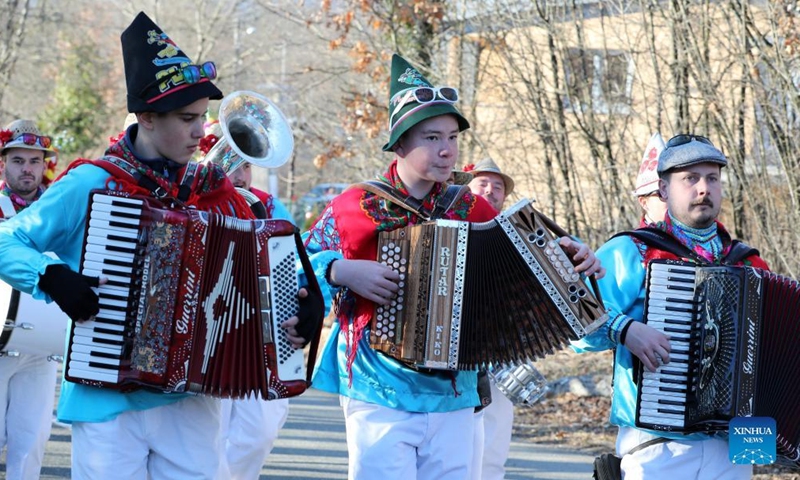 Bell ringers take part in a traditional Croatian carnival procession at Permani, Croatia on Feb. 13, 2022.Photo:Xinhua