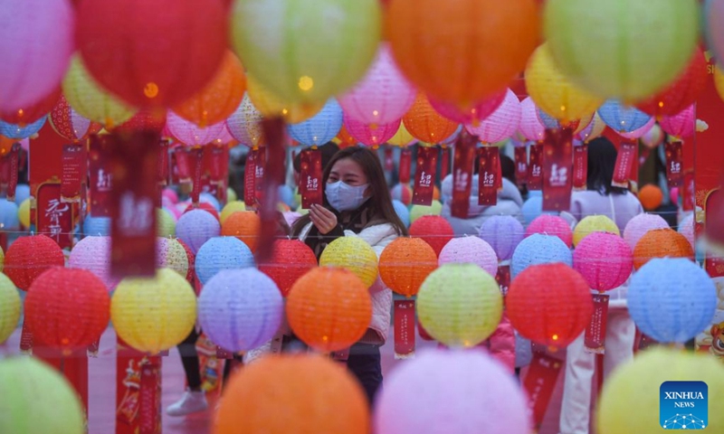 Residents take part in a riddle guessing activity to celebrate the upcoming Lantern Festival in the ancient town of Shouchang in Jiande, east China's Zhejiang Province, Feb. 14, 2022.(Photo: Xinhua)