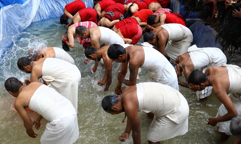 Devotees are seen during the Madhav Narayan Festival in Bhaktapur, Nepal, Feb. 14, 2022.Photo:Xinhua