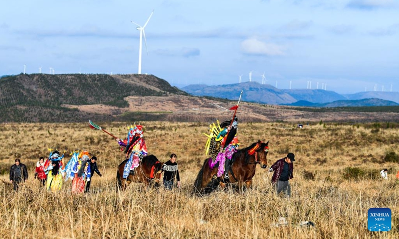 Members of a local opera troupe head for a rehearsal in Longshan Township, southwest China's Guizhou Province, Feb. 7, 2022. Deep in the mountains in Longli County, Qiannan Buyi and Miao Autonomous Prefecture, there is a grass-roots troupe performing Taiping Huadengxi, or Taiping lantern opera, in Longli.(Photo: Xinhua)