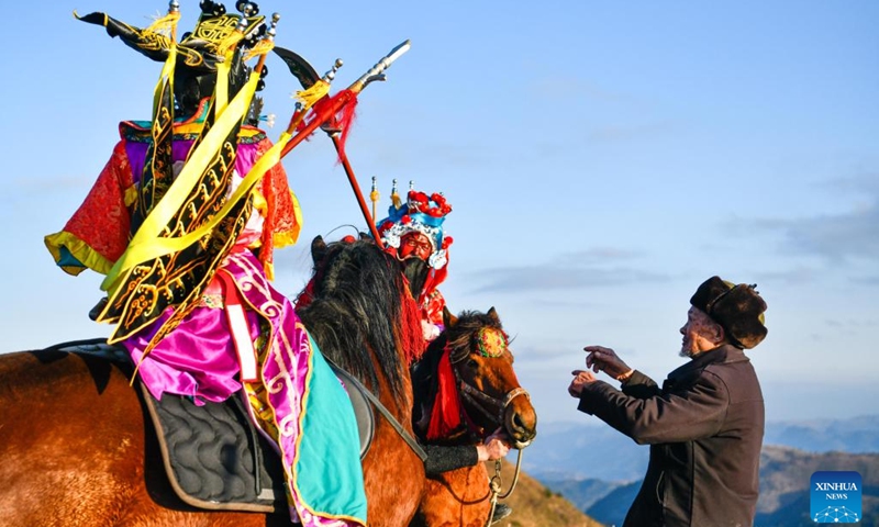 Members of a local opera troupe rehearse in Longshan Township, southwest China's Guizhou Province, Feb. 7, 2022. Deep in the mountains in Longli County, Qiannan Buyi and Miao Autonomous Prefecture, there is a grass-roots troupe performing Taiping Huadengxi, or Taiping lantern opera, in Longli. (Photo: Xinhua)