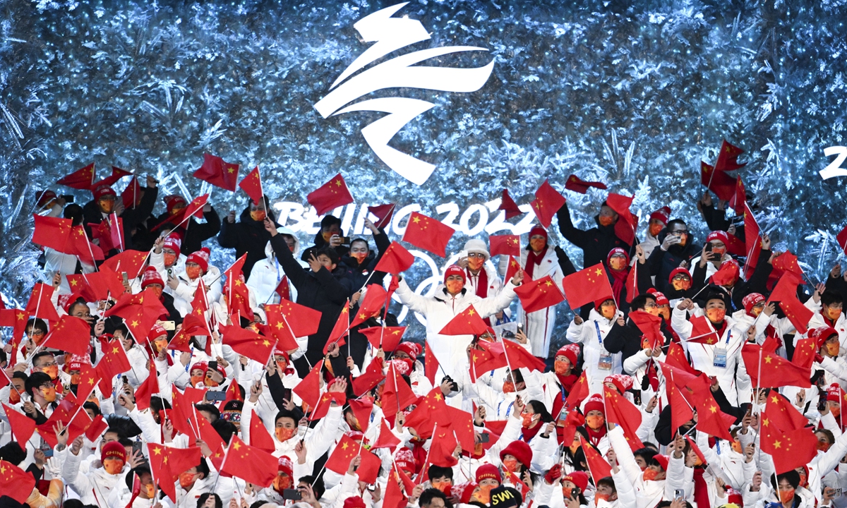 Members of Team China enter the National Stadium for the closing ceremony on February 20, 2022. Photo: Xinhua