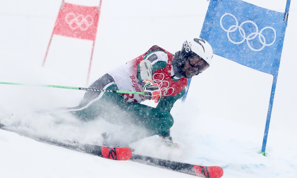 Fayik Abdi of Saudi Arabia competes during the first run of the men's giant slalom race of the Alpine skiing events of the Beijing 2022 Winter Olympic Games on February 13, 2022. Photo: IC