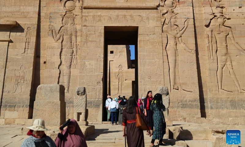 Tourists visit the Philae temple complex in Aswan, Egypt, on Feb. 21, 2022. The Philae temple complex, one of the most popular tourist destinations in Aswan, is entering tourist season.(Photo: Xinhua)