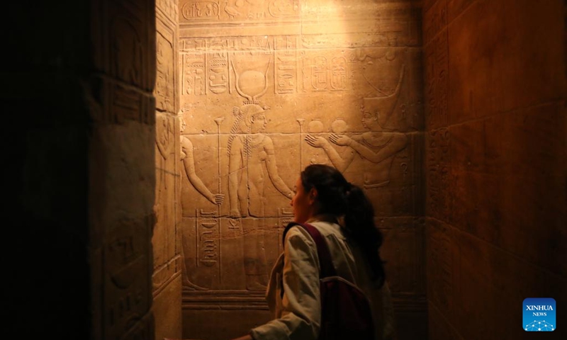 A tourist visits the Philae temple complex in Aswan, Egypt, on Feb. 21, 2022. The Philae temple complex, one of the most popular tourist destinations in Aswan, is entering tourist season.(Photo: Xinhua)