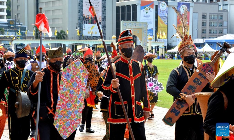 People join a parade during Brunei's National Day celebrations in Bandar Seri Begawan, capital of Brunei, on Feb. 23, 2022.(Photo: Xinhua)