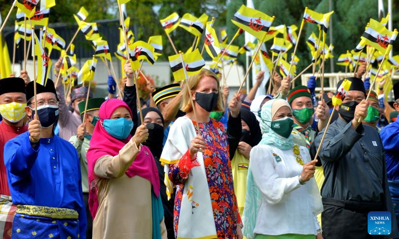 People join a parade during Brunei's National Day celebrations in Bandar Seri Begawan, capital of Brunei, on Feb. 23, 2022.(Photo: Xinhua)