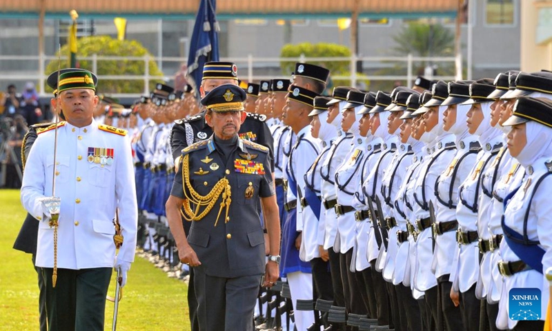 Brunei's Sultan Haji Hassanal Bolkiah (2nd L, Front) inspects a guard of honor during the country's National Day celebrations in Bandar Seri Begawan, capital of Brunei, on Feb. 23, 2022.(Photo: Xinhua)