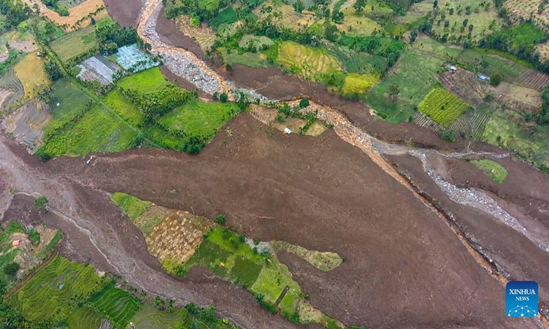 An aerial photo released by District Disaster Management Agency (BPBD) Limapuluh Kota shows mud caused by landslides after a 6.1 magnitude quake in Pasaman Barat, West Sumatra, Indonesia, Feb. 27, 2022. (BPBD Limapuluh Kota/Handout via Xinhua)