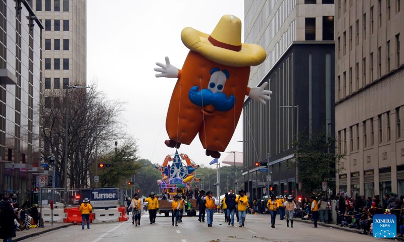 Howdy, the official mascot of the Houston Livestock Show and Rodeo, is seen during the 90th Downtown Rodeo Parade in Houston, Texas, the United States, Feb. 26, 2022. (Photo by Lao Chengyue/Xinhua)