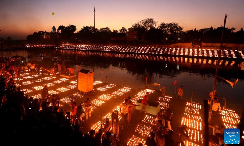 Devotees light earthen lamps on the banks of the Kshipra River on the occasion of Hindu festival Mahashivratri in Ujjain area, Madhya Pradesh state, India, on March 1, 2022.Photo:Xinhua