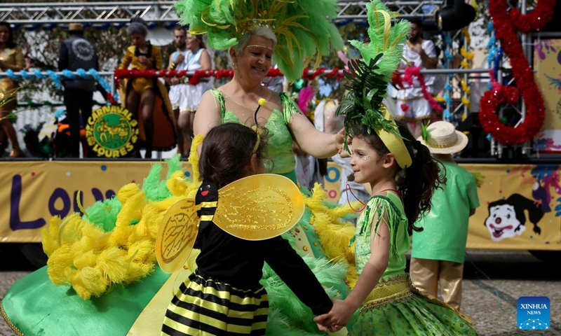 Revelers take part in a carnival parade in Loures, outskirts of Portugal's capital Lisbon, March 1, 2022.Photo:Xinhua