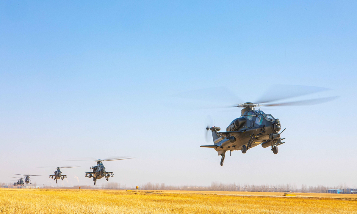 Attack helicopters attached to an army aviation brigade of the PLA 80th Group Army fly in formation during a flight training exercise on February 23, 2022.Photo:China Military