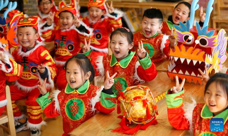 Children play games to greet the Longtaitou Day in Jimo District, Qingdao, east China's Shandong Province, March 3, 2022. Literally meaning dragon raises head, the day of Longtaitou, the second day of the second lunar month, falls on Friday this year.Photo:Xinhua