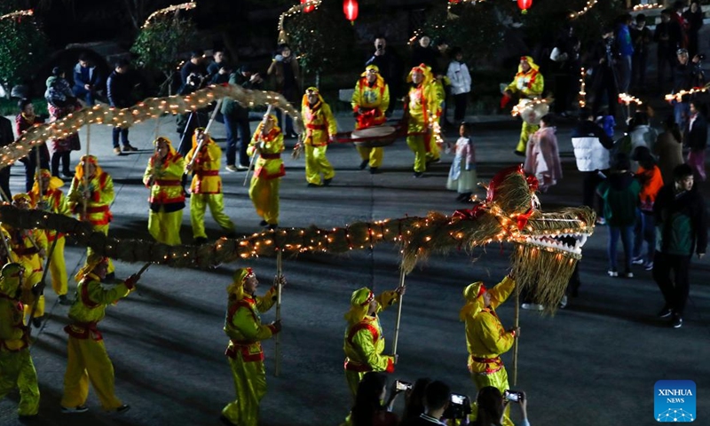 Villagers perform dragon dance to greet the Longtaitou Day in Huizhou District of Huangshan, east China's Anhui Province, March 2, 2022.Photo:Xinhua