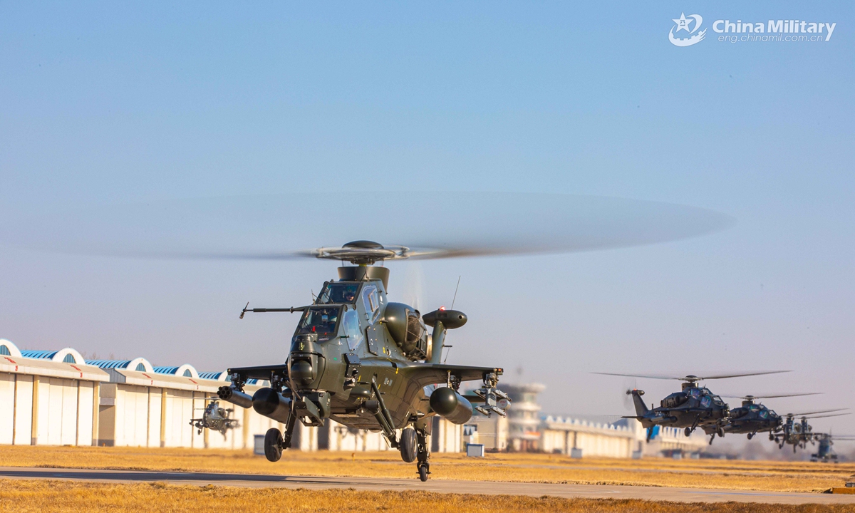 Attack helicopters attached to an army aviation brigade of the PLA 80th Group Army fly in formation during a flight training exercise on February 23, 2022.Photo:China Military