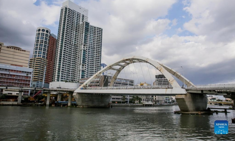 The China-funded Binondo-Intramuros Bridge is under construction in Manila, the Philippines on March 3, 2022. The Binondo-Intramuros Bridge is a steel bowstring arch bridge in Manila City that will connect the Intramuros side and Binondo side over the Pasig River.(Photo: Xinhua)