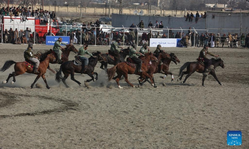 Horse riders compete during a game of Buzkashi, or goat grabbing in English, in Kabul, capital of Afghanistan, Feb 27, 2022.Photo:Xinhua