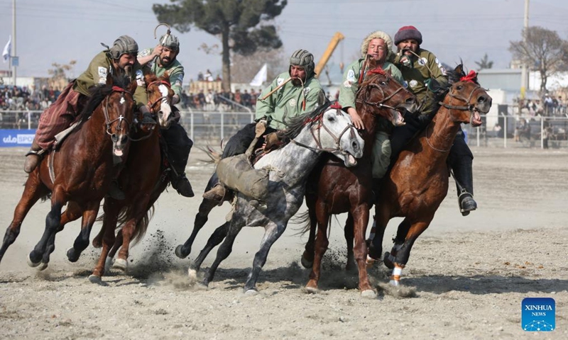 Horse riders compete during a game of Buzkashi, or goat grabbing in English, in Kabul, capital of Afghanistan, Feb 27, 2022.Photo:Xinhua