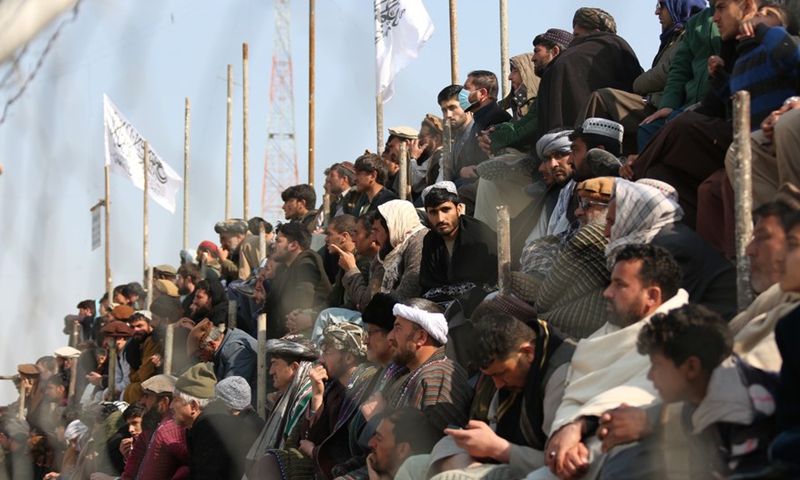 People watch a game of Buzkashi, or goat grabbing, in Kabul, capital of Afghanistan, Feb. 27, 2022.Photo:Xinhua