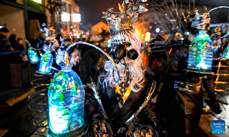 Costumed revelers perform during the great evening carnival on the streets of Strumica, North Macedonia, March 5, 2022.Photo:Xinhua