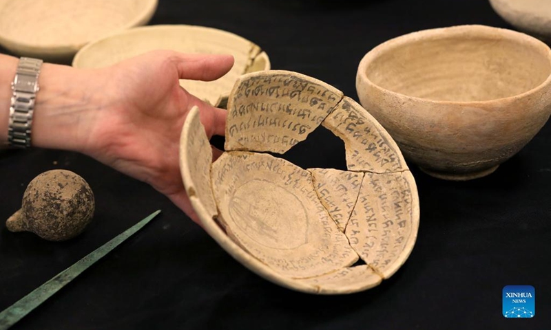 Ancient magical bowls are shown in Jerusalem, on March 7, 2022. Ancient magical bowls, carrying spells and incantations scripts in the Hebrew and Babylonian-Aramaic languages, were uncovered in Jerusalem, the Israel Antiquities Authority (IAA) said on Monday.(Photo: Xinhua)