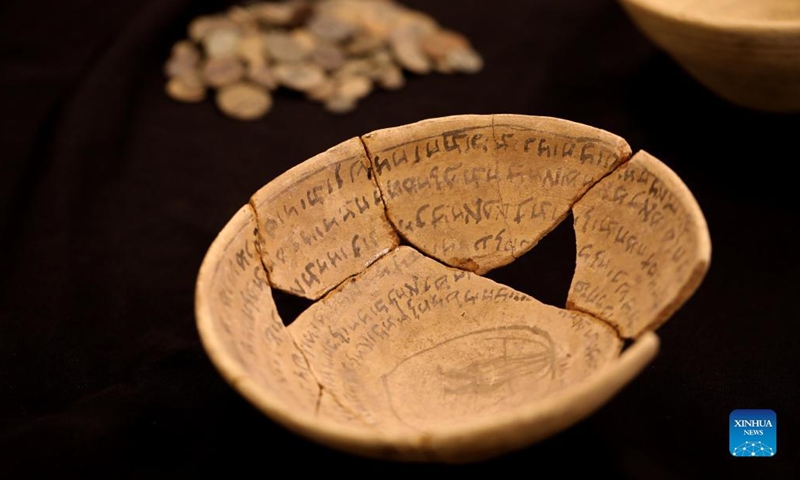 Photo taken on March 7, 2022 shows an ancient magical bowl in Jerusalem. Ancient magical bowls, carrying spells and incantations scripts in the Hebrew and Babylonian-Aramaic languages, were uncovered in Jerusalem, the Israel Antiquities Authority (IAA) said on Monday.(Photo: Xinhua)