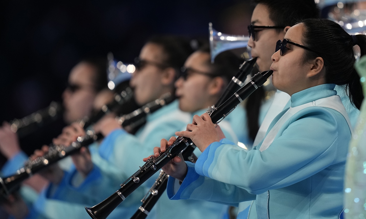 The Yangfan Wind Band enters the Opening Ceremony of the Beijing 2022 Paralympic Winter Games on March 4, 2022. 
Top: The Yangfan Wind Band
Photos: IC