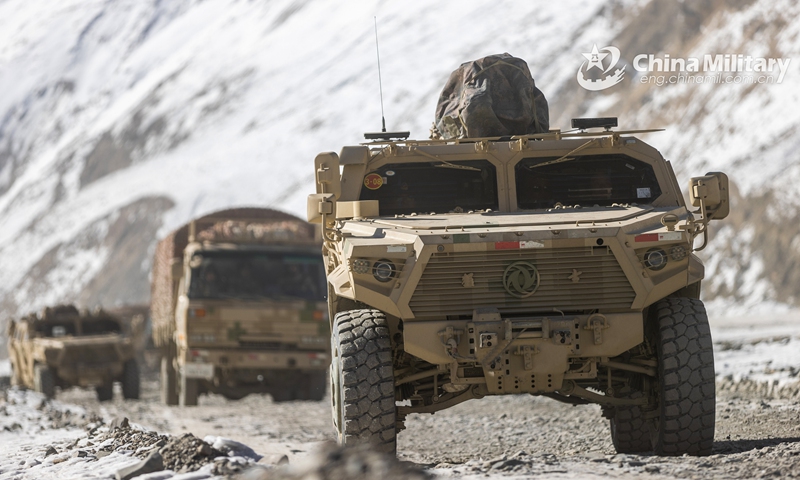 Dongfeng Mengshi off-road tactical armored vehicles attached to a regiment under the PLA Xinjiang Military Command advance in complex road conditions during a driving training exercise on February 21, 2022. (eng.chinamil.com.cn/Photo by Zhang Kai)