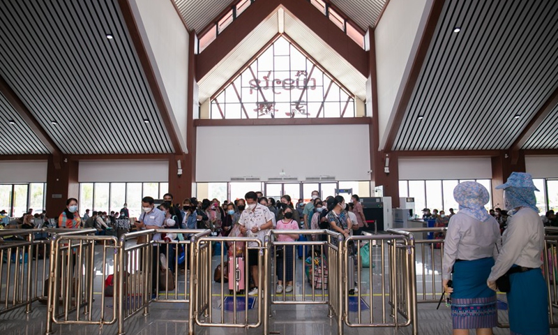 Passengers line up at the waiting hall of the China-Laos Railway's Muangxay Station in Muangxay, northern Laos, March 11, 2022.Photo:Xinhua