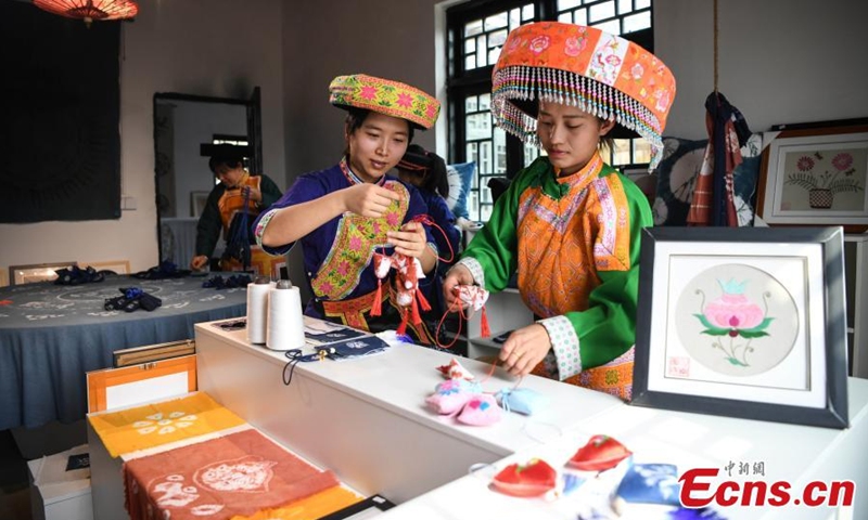 Batik art works are seen at Gulin County, Luzhou City, Sichuan Province. (Photo: China News Service/Liu Chuanfu)