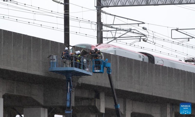 Staff members maintain damaged facilities after an earthquake in Shiroishi City of Miyagi Prefecture, Japan, March 18, 2022.Photo:Xinhua