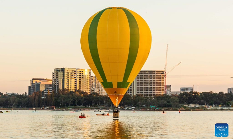 Hot air balloons are seen during the annual Canberra Balloon Spectacular festival in Canberra, Australia, March 18, 2022. The annual Canberra Balloon Spectacular festival, a hot air balloon festival celebrated in Australia's capital city, is held this year from March 12 to 20.Photo:Xinhua