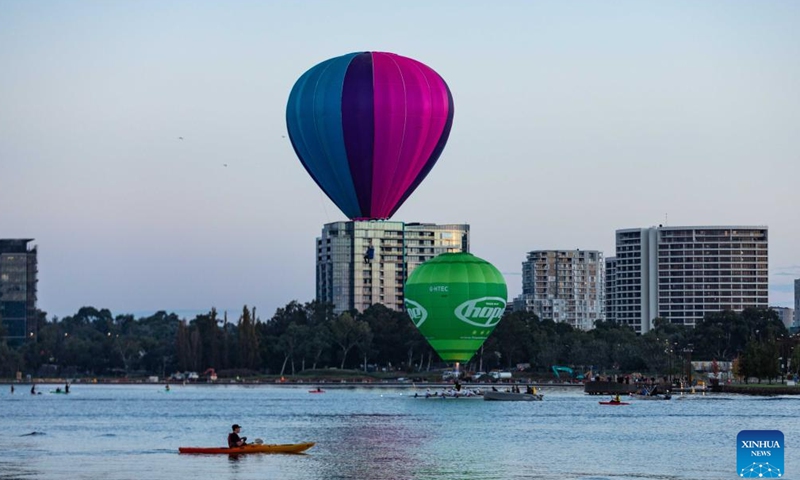 Hot air balloons are seen during the annual Canberra Balloon Spectacular festival in Canberra, Australia, March 18, 2022. The annual Canberra Balloon Spectacular festival, a hot air balloon festival celebrated in Australia's capital city, is held this year from March 12 to 20.Photo:Xinhua