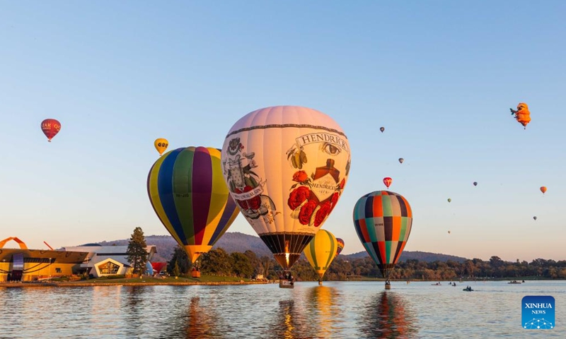 Hot air balloons are seen during the annual Canberra Balloon Spectacular festival in Canberra, Australia, March 18, 2022. The annual Canberra Balloon Spectacular festival, a hot air balloon festival celebrated in Australia's capital city, is held this year from March 12 to 20.Photo:Xinhua