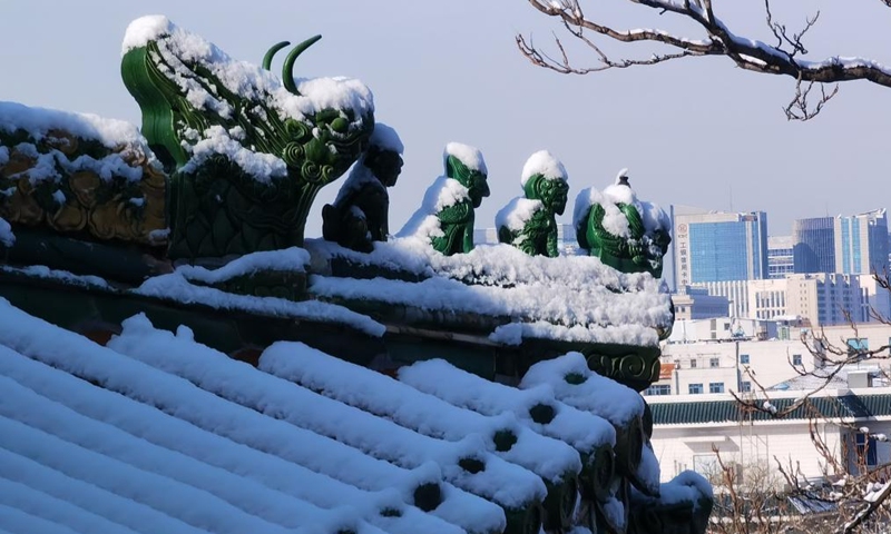 Photo taken with a mobile phone shows the snow scenery at Beihai Park in Beijing, capital of China, March 19, 2022.Photo:Xinhua