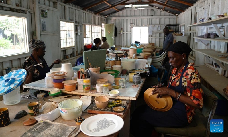 Women work at the Kazuri workshop in Nairobi, Kenya, on March 21, 2022. Kazuri, Swahili name for small and beautiful, is a famous local brand for hand-made and hand-painted ceramic beads, jewelry and pottery in Kenya. The Kazuri workshop in Kazen has employed over 340 women, mostly single mothers.(Photo: Xinhua)