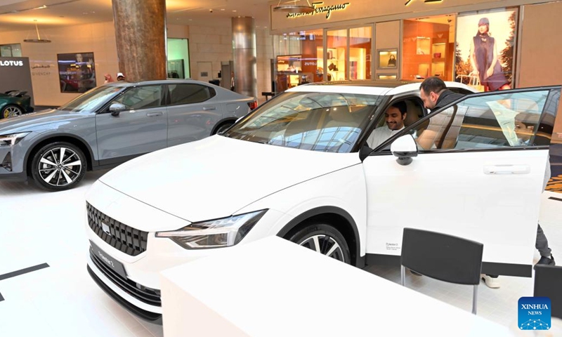 People visit a motor show in Hawalli Governorate, Kuwait, March 23, 2022. The Kuwait Motor Show 2022, which will last until April 1, opened in Hawalli Governorate on Wednesday.(Photo: Xinhua)