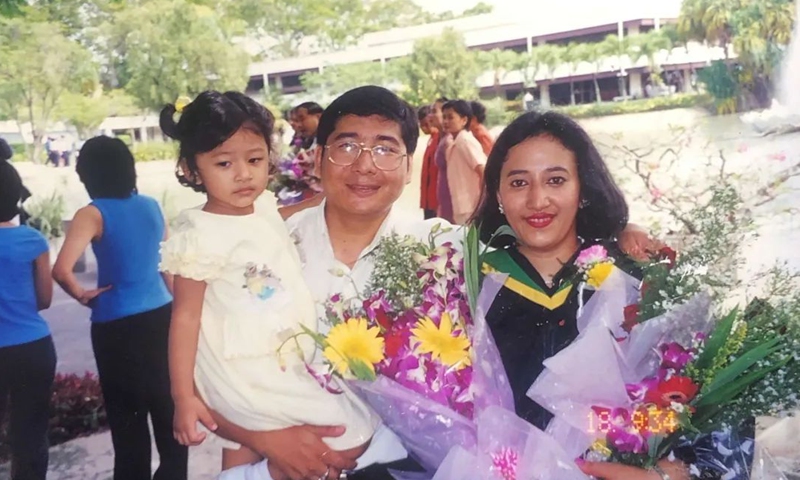 Aneka attending a her mother's master's graduation in Thailand