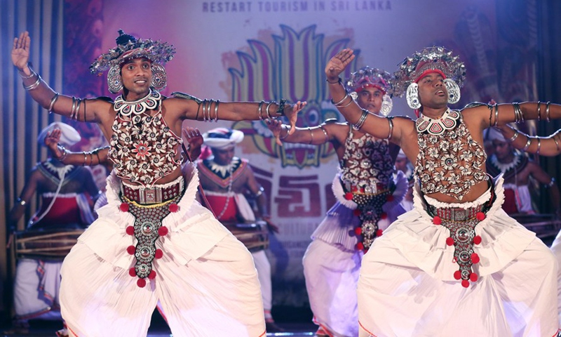 Dancers perform during a cultural dance show to promote tourism in Colombo, Sri Lanka, on March 25, 2022.Photo:Xinhua