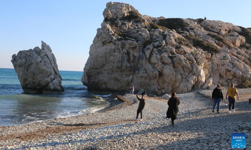 People visit the Petra tou Romiou, also known as Aphrodite's Rock, in Paphos, Cyprus, March 27, 2022.Photo:Xinhua