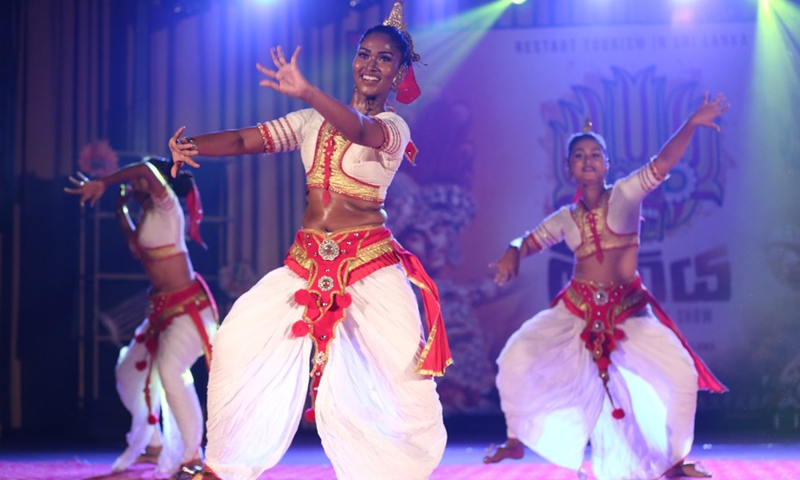 Dancers perform during a cultural dance show to promote tourism in Colombo, Sri Lanka, on March 25, 2022.Photo:Xinhua